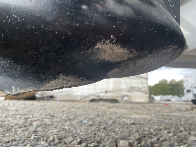 broken fin and sanded drain plug screwhead