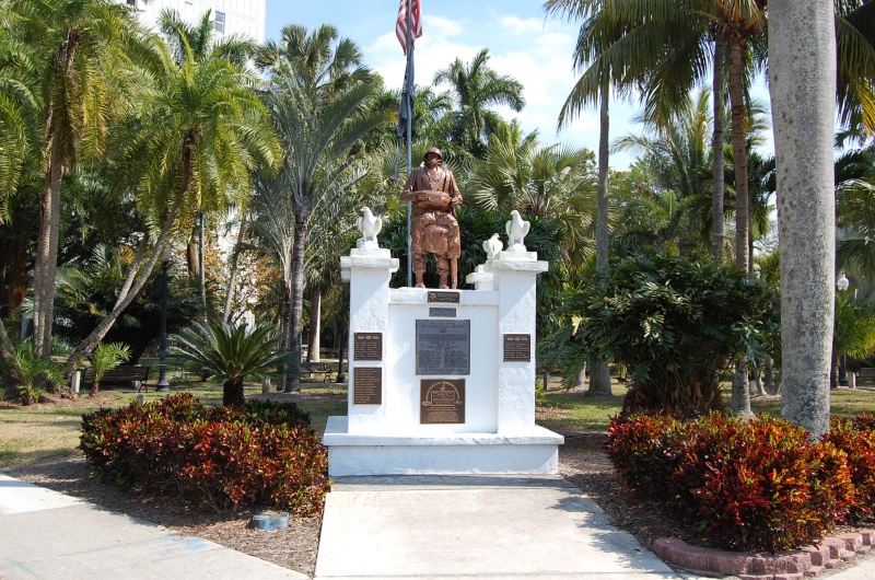 Bronze Memorial for Congressional Metal of Honor Veteran Rodolpho Hernandez 82nd Airborne Behind is a garden of Palms from all over the world