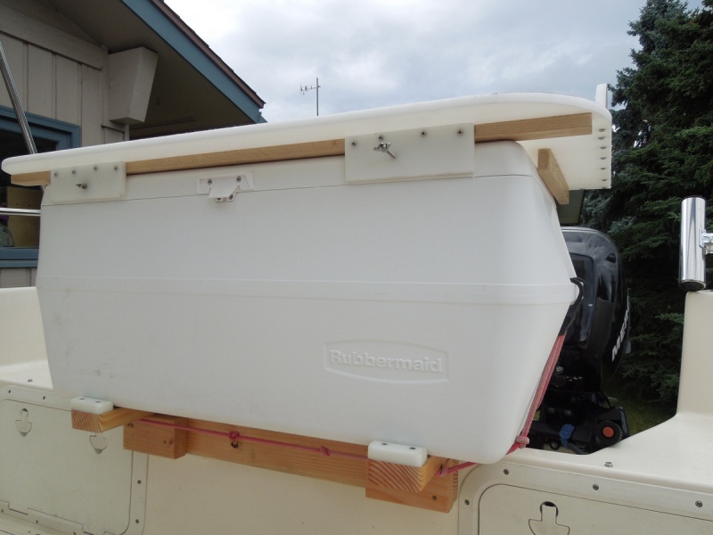 Bungee cord shown here front and back, I now use cam straps to hold it in place.