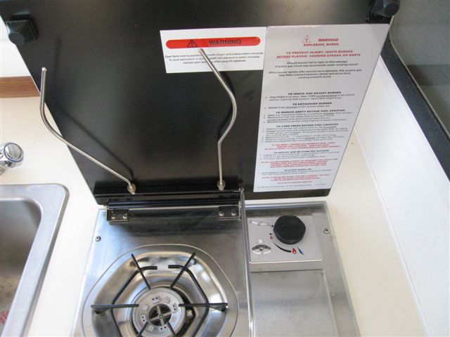 Butane Stove.works great...found butane canesters for 70cents each in Oakland chinatown