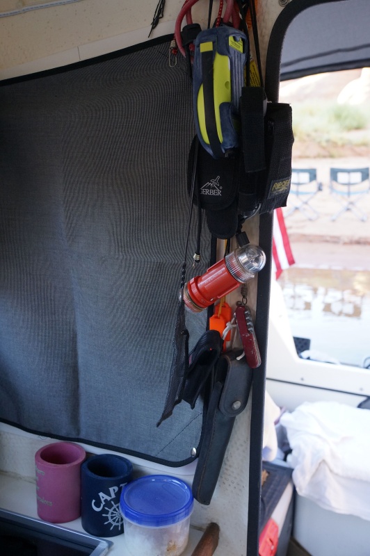 By the door--PLB, multi-tools, knives, stobe whistle etc