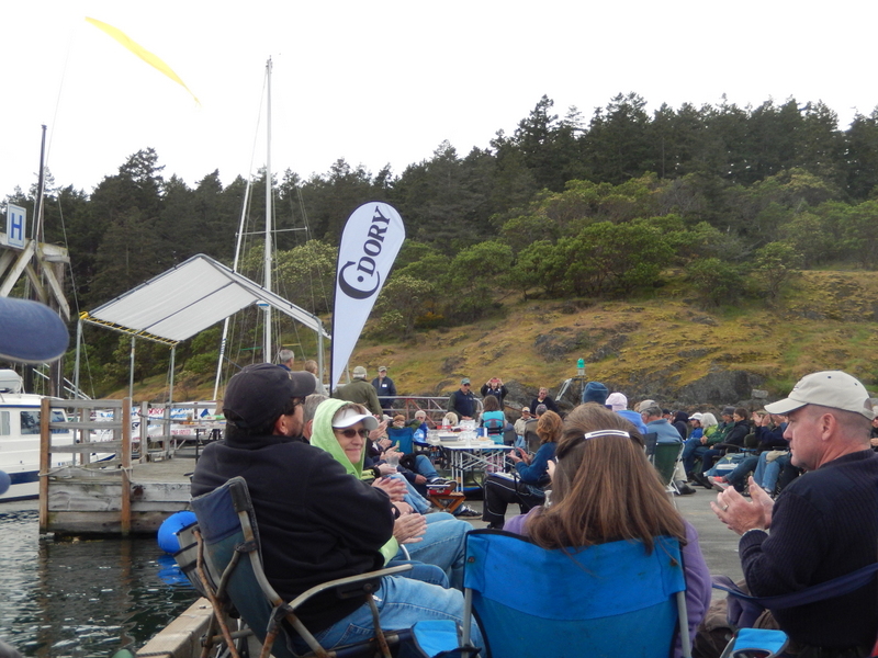C-Brats at the potluck dinner on the dock 
at the Saturday-evening gathering