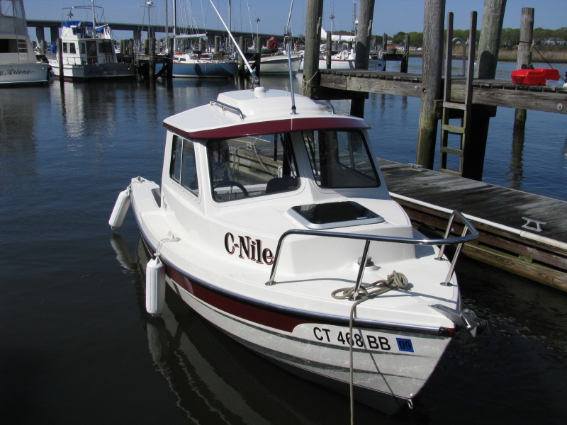 C-Dory 16 Cruiser tied to floating dock