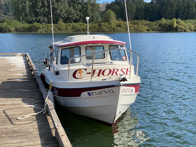 c-dory \"C-Horse\" in the water.