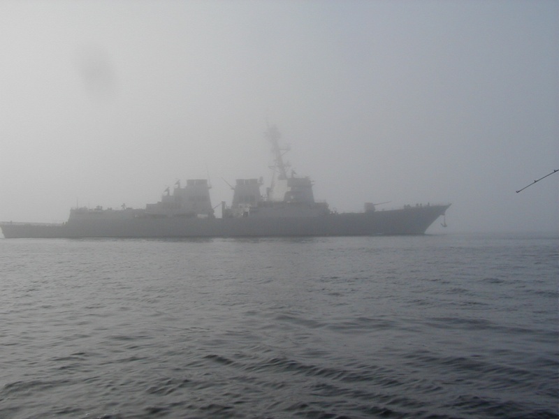 (C-Fisher)It was much closer then it looks in the photo, we could easily see the men standing on the bow.