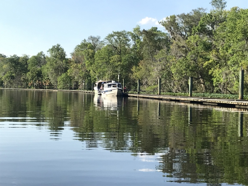 C Traveler and Mystery Girl at dock on 6 Mile Creek