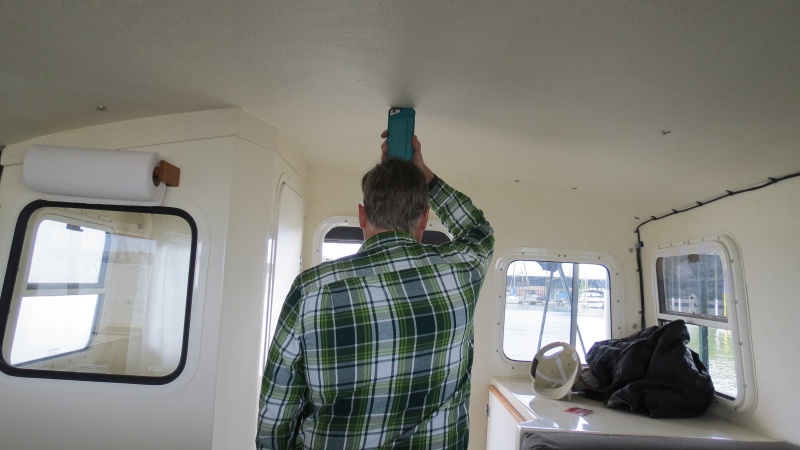 Cabin Height - I am 6' 2".  This shows the extra room above my head (with an iphone).