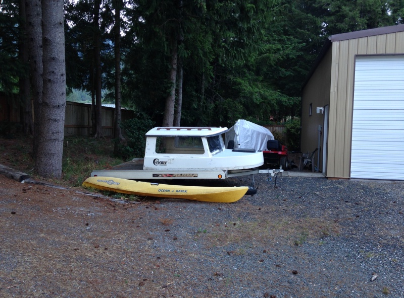 Cabin removed from hull, took 3 of us to carry it there