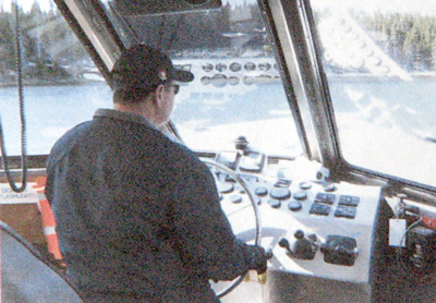 Captain Jim at the helm