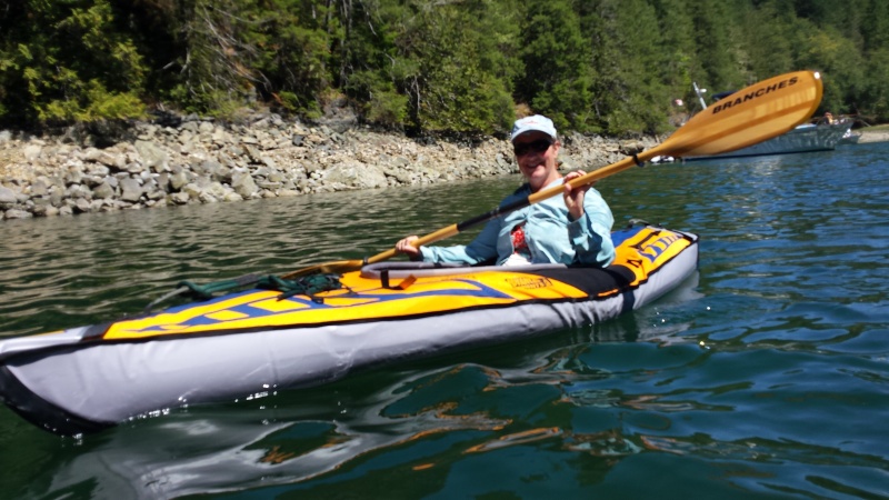 Caryn on brand new Advanced Elements inflatable kayak in Roscoe Cove