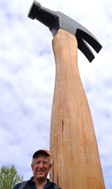 Casey and the 20 foot hammer at the Haines Hammer Museum.