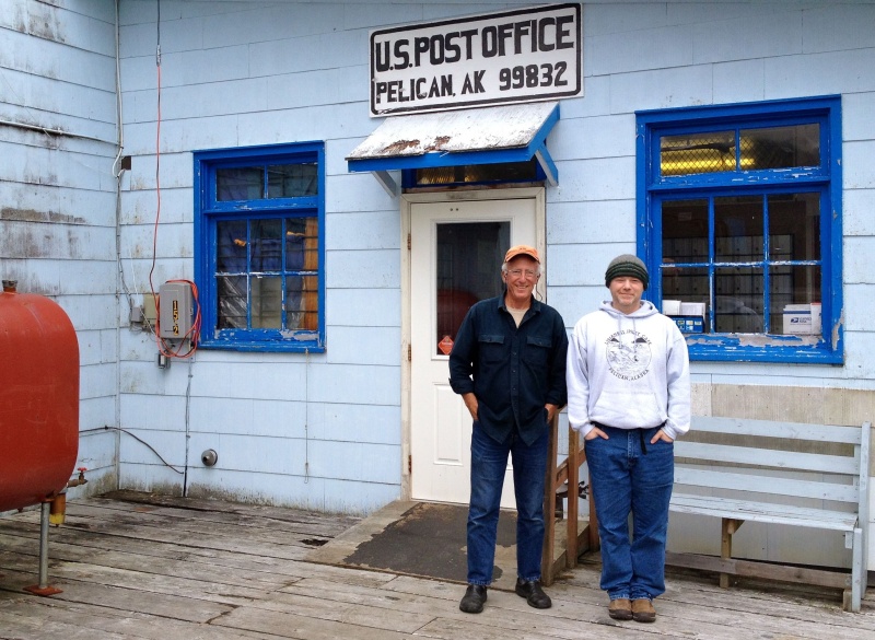 Casey with John, the postmaster at Pelican