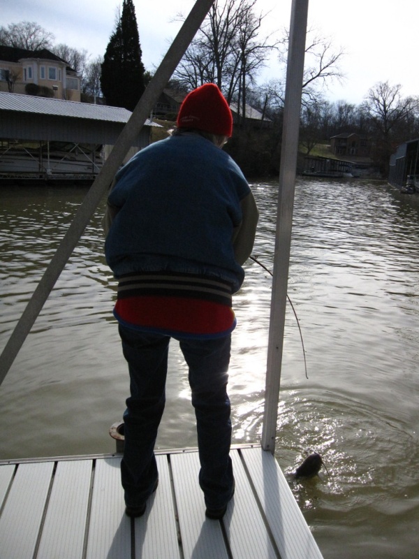 Cathy catching Catfish Hunter