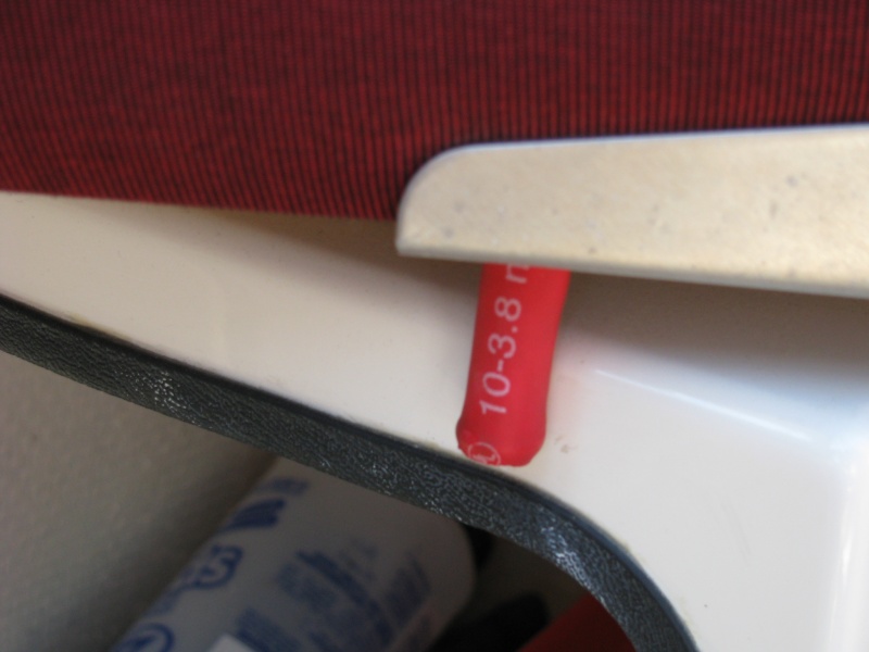Chair Stop -- Close up of rubber coated bolt, which prevents the fiberglass from damage
