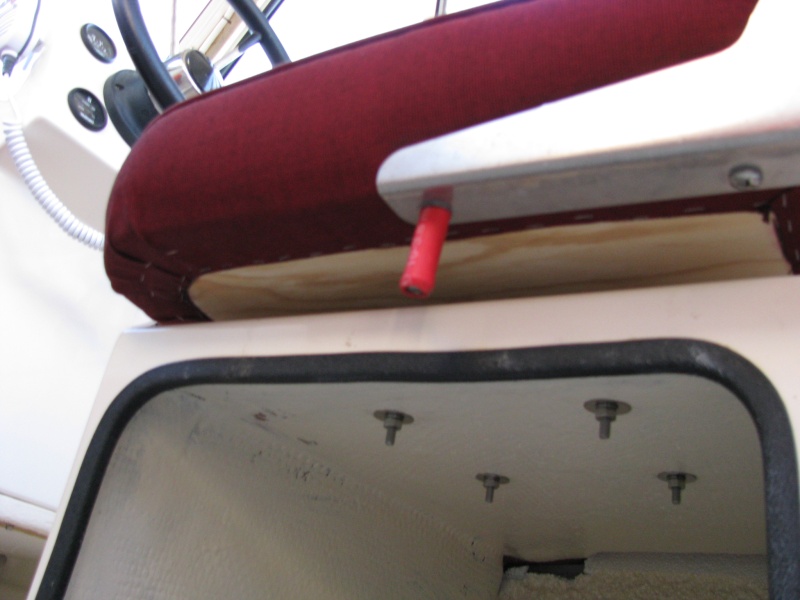 Chair Stop -- View from below.  Our dealer removed the old seat bolt and replaced it with a longer, rubber coated bolt.