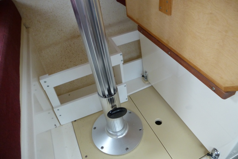 Chart and book rack under table