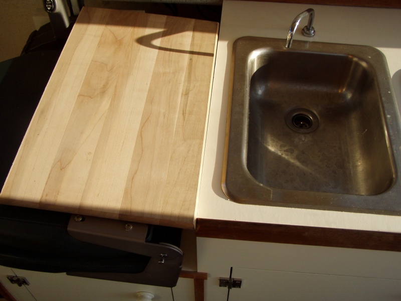 Chopping Block Extends Galley Countertop Over Flat Helm Seat