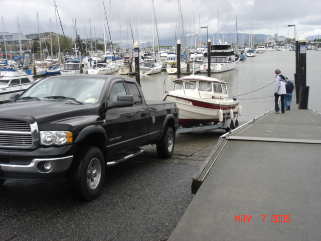 Chuck aka Spike & Kathy, owners of BOOTLEG HOOCH, launching at Squalicum Harbor.