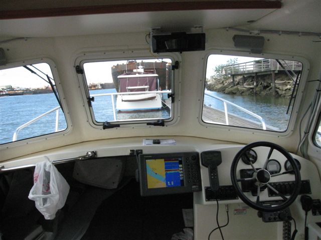 Clean uncluttered.. install  ...Furuno..NavNet..NavPilot..Furuno VHF..Honda Digital Tachs and Fuel Management guages