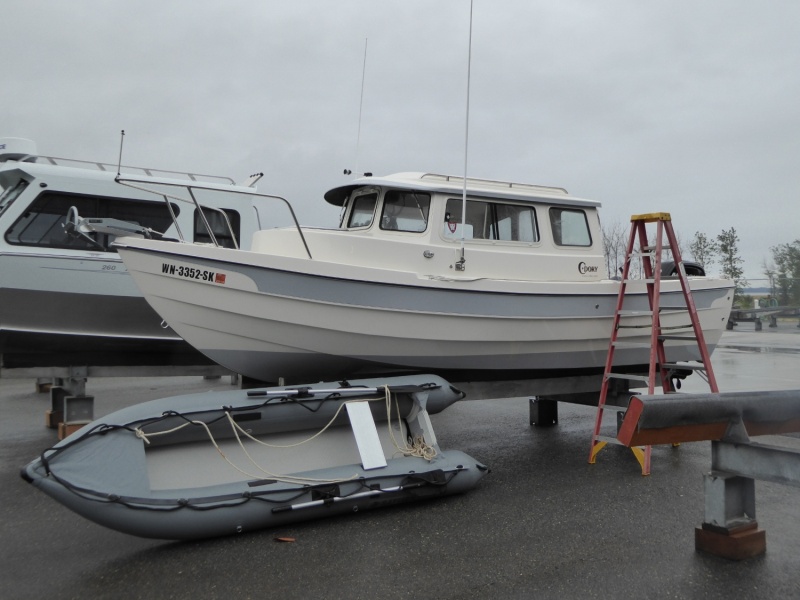 Cleaning up both boats.  The weekend of test-runs was a huge success - New Permatrim, Kaboat, 2.5 Suzuki, Garmin, and 6 hp Kicker. Almost ready for Desolation Sound!