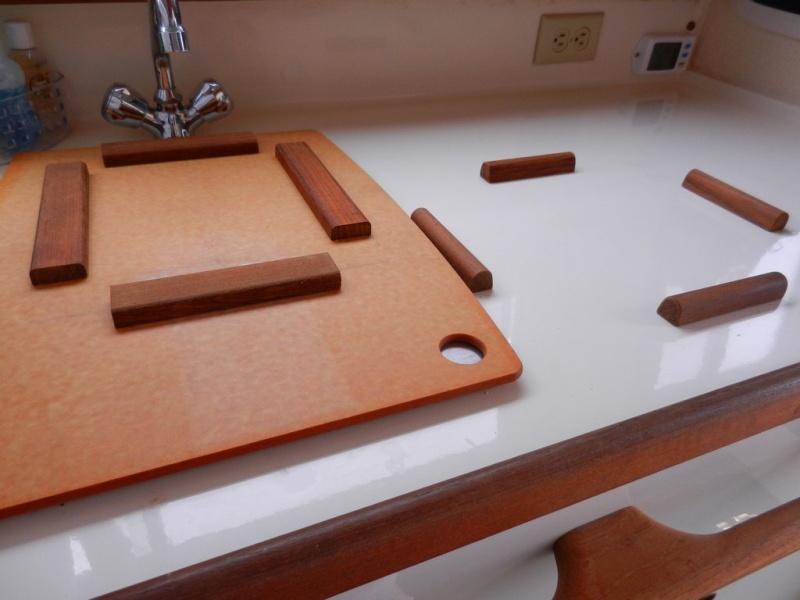 Cleats glued to galley counter and back of cutting board.