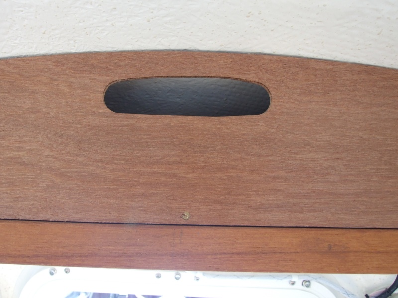 Close-up.  Cut-out handle provides breathing to help prevent condensation inside locker.