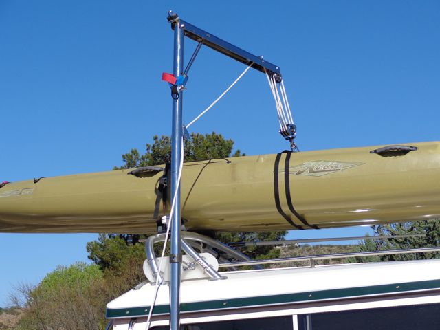 Close-up of our newly installed Garhauer Lift after lifting our 87 pound Hobie Mirage Tandem Kayak securely on top of Katmai.