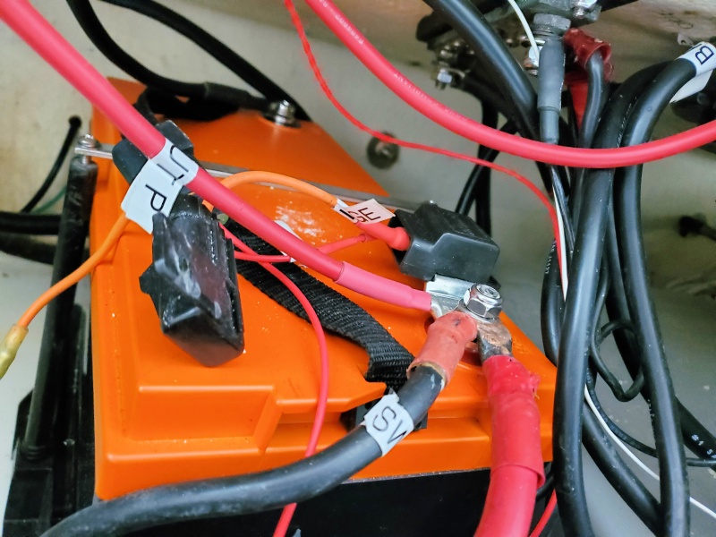Close up of the battery.  Size 31. Contains internal BMS. Notice all the wires going to the pos terminal.  Tried to reduce them but no luck.
