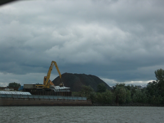 Coal barge being unloaded