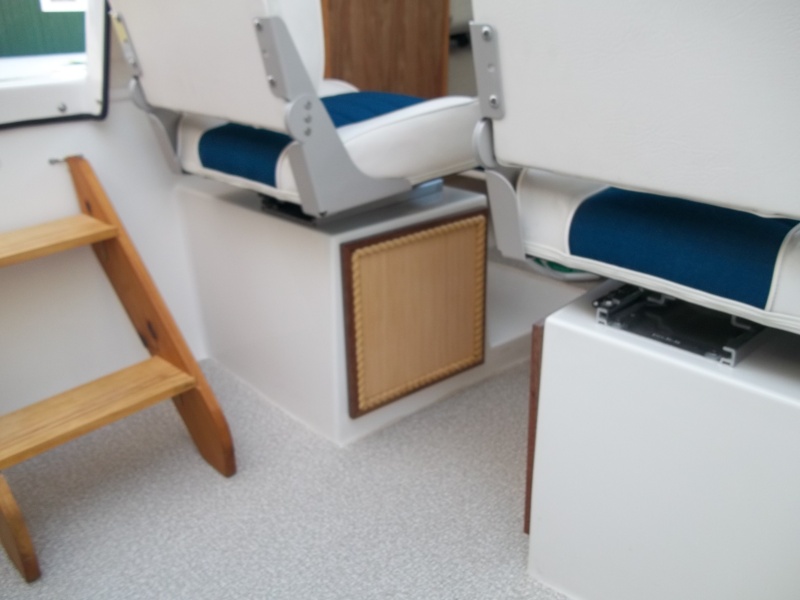 cockpit steps, cabinet doors and vinyl flooring