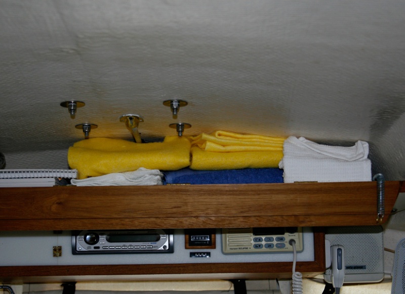 Console Shelf Door Down shows storage area for towels and misc books.