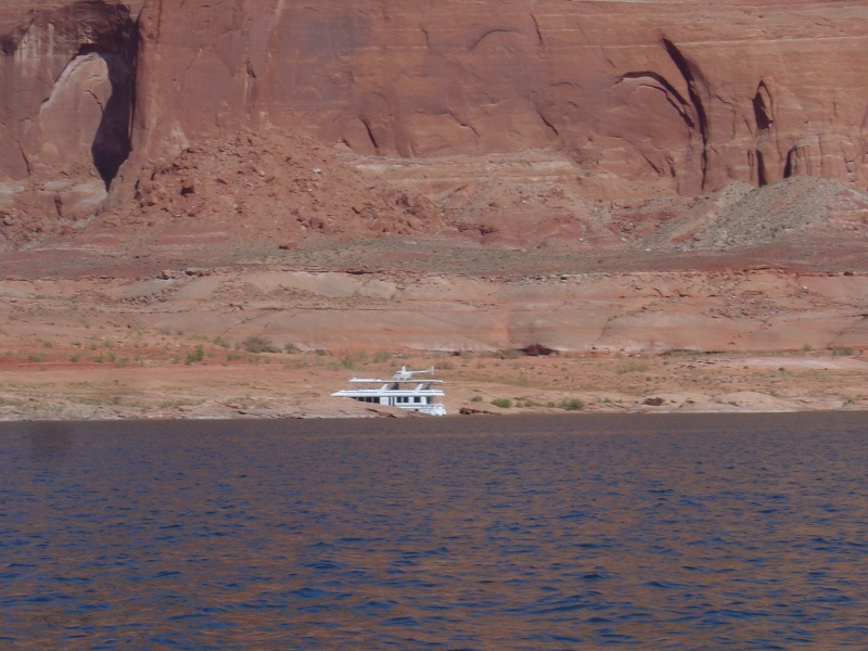 conspicuous consumption--houseboat with a helicopter on top