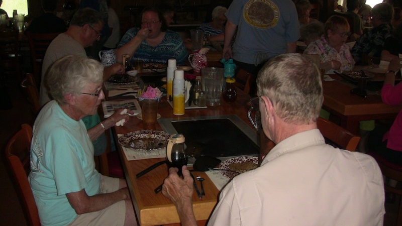 cookin pancakes at the Spanish Mill restaurant.