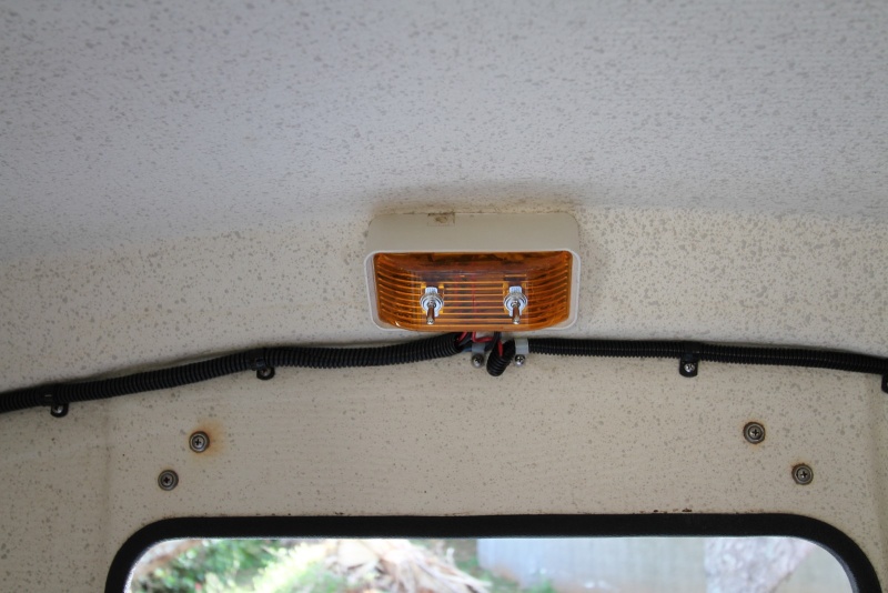 Courtesy and exterior light switches in old light.