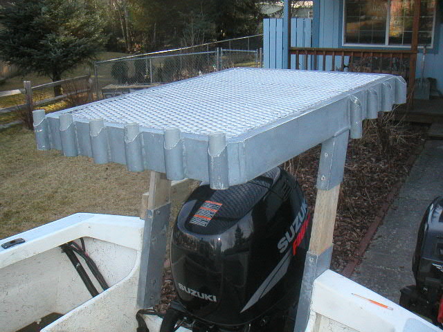 Courtesy of Red Fox, I welded on the grating.