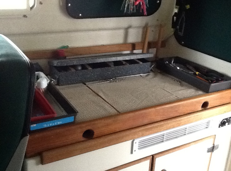 Cover over sink and stove. Perfect work area while fishing