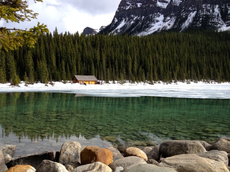 Crystal clear, emerald green water at Lake Louise, B.C.