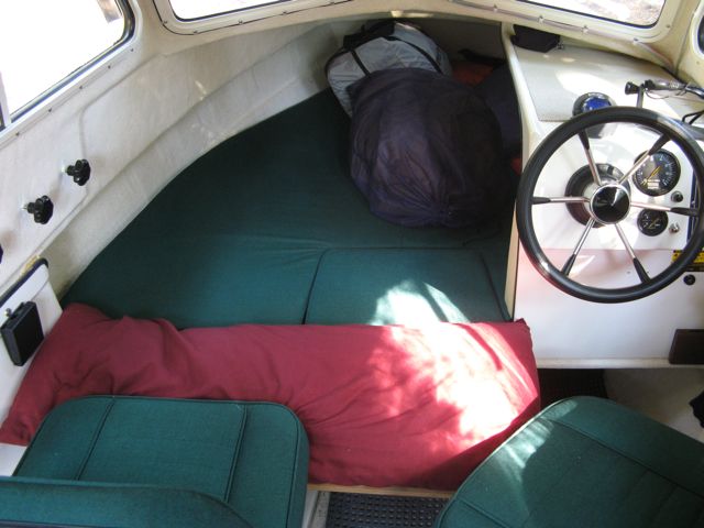 Cushion in place on berth extension. Very comfy! Width is approx 39" (single bed size) across extended section. Length about 7 feet.
