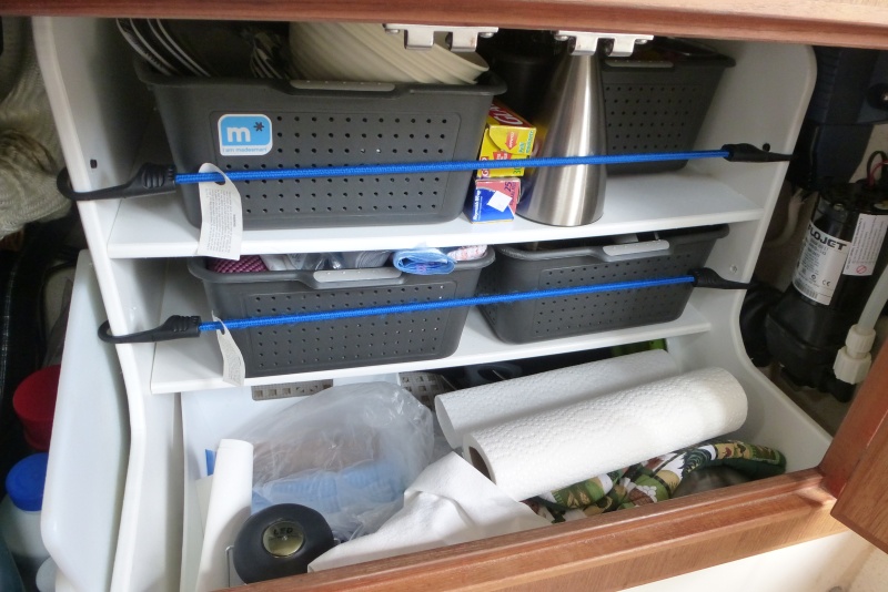 Custom shelving under sink made from starboard