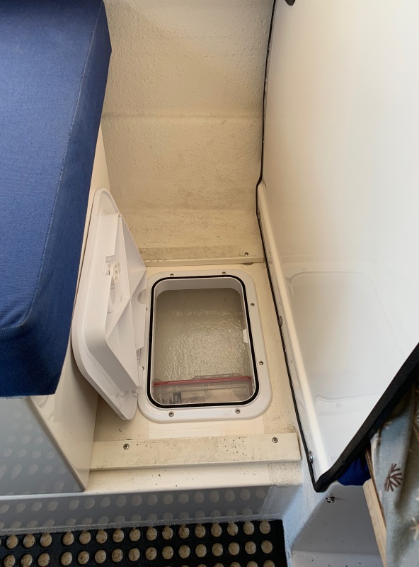 Cut in 2 hatches for storage under seat.
