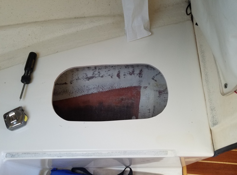 Cut out on starboard side of V berth.