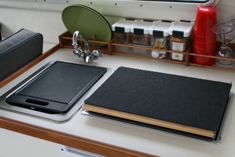 Cutting board and non-skid padding for top of the Wallace