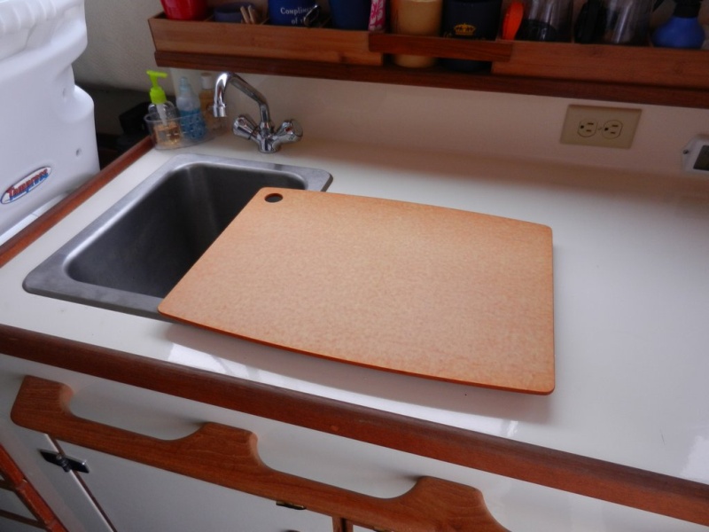 Cutting board on counter - fits into cleats to hold in place