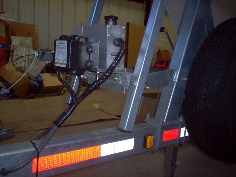 (Cygnet) Moved the electric/hydraulic actuator up 10 1/2" for easier launching and loading