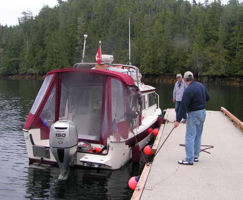 Dave and Alan Olson securing Daydream on float at Pruth Bay 6-13-06