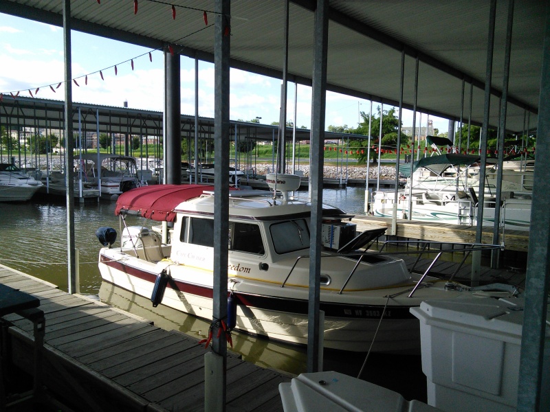 Docked at Alton Marina just north of St Louis during the Mississippi River gathering.  Having our air conditioner in the center window was heavenly!