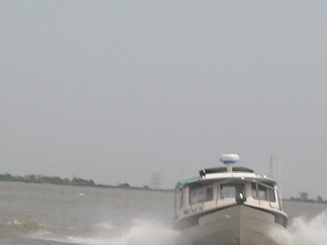 Dr. Bob in Frequent Sea - closing from astern.