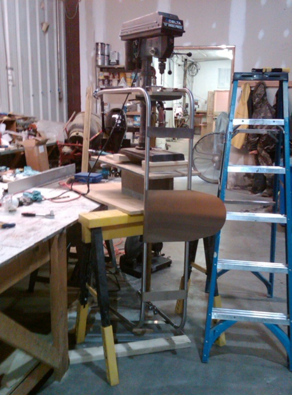 drilling holes in arch with Rube Goldberg