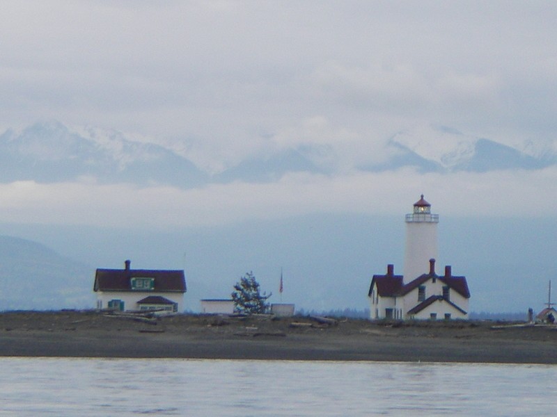 Dungeness Spit Lighthouse with Olympic Mountian backdrop