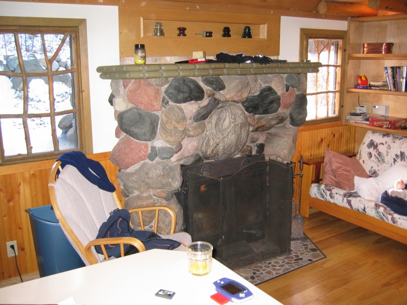 Each interior window has a handmade shutter that uses cedar branches for the "grills" in the windows.